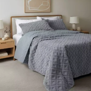 Edredón de corderito 1 1/2 pl + 1 funda de almohadón